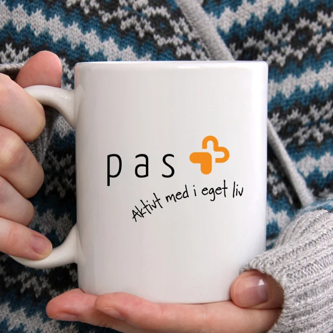 Logo PAS på kopp